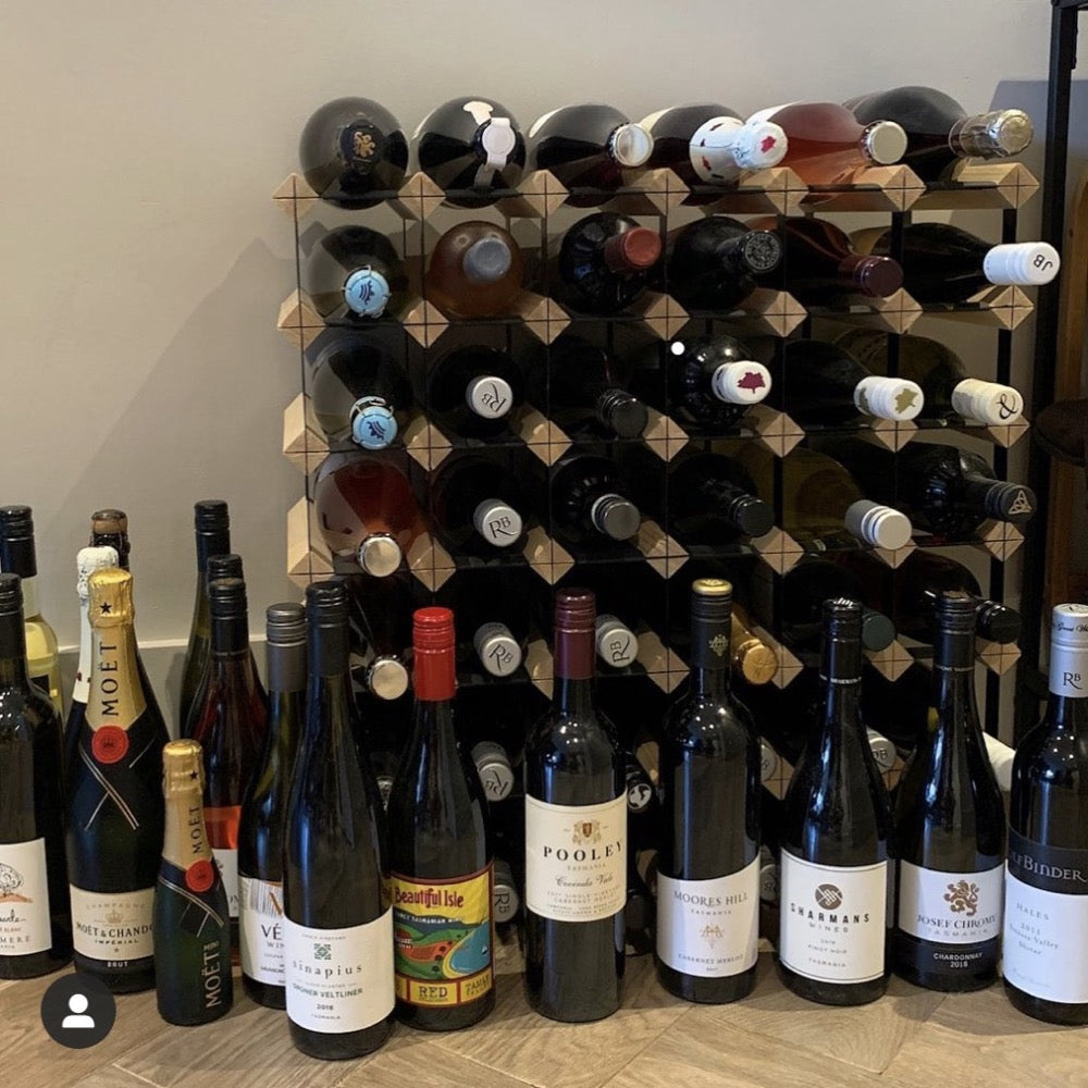 Partially filled 42 Bottle Wine Rack with Wine Bottles